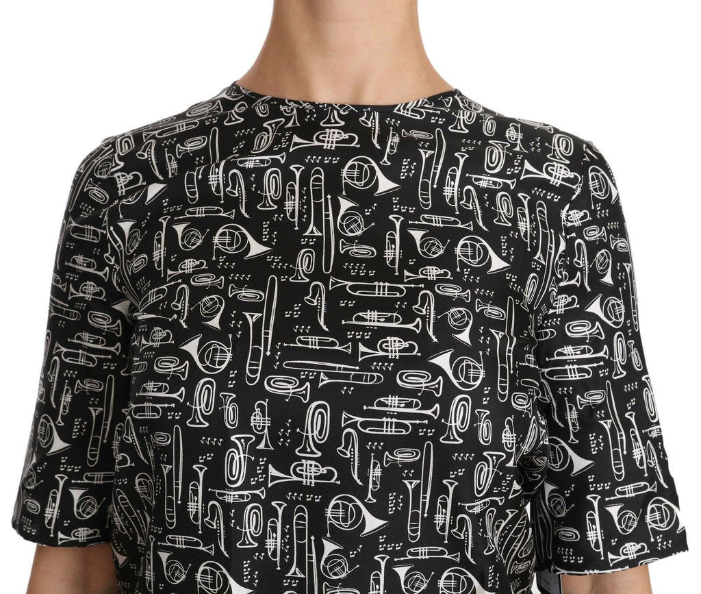 Blusa de seda negra con estampado de instrumentos musicales de Dolce &amp; Gabbana