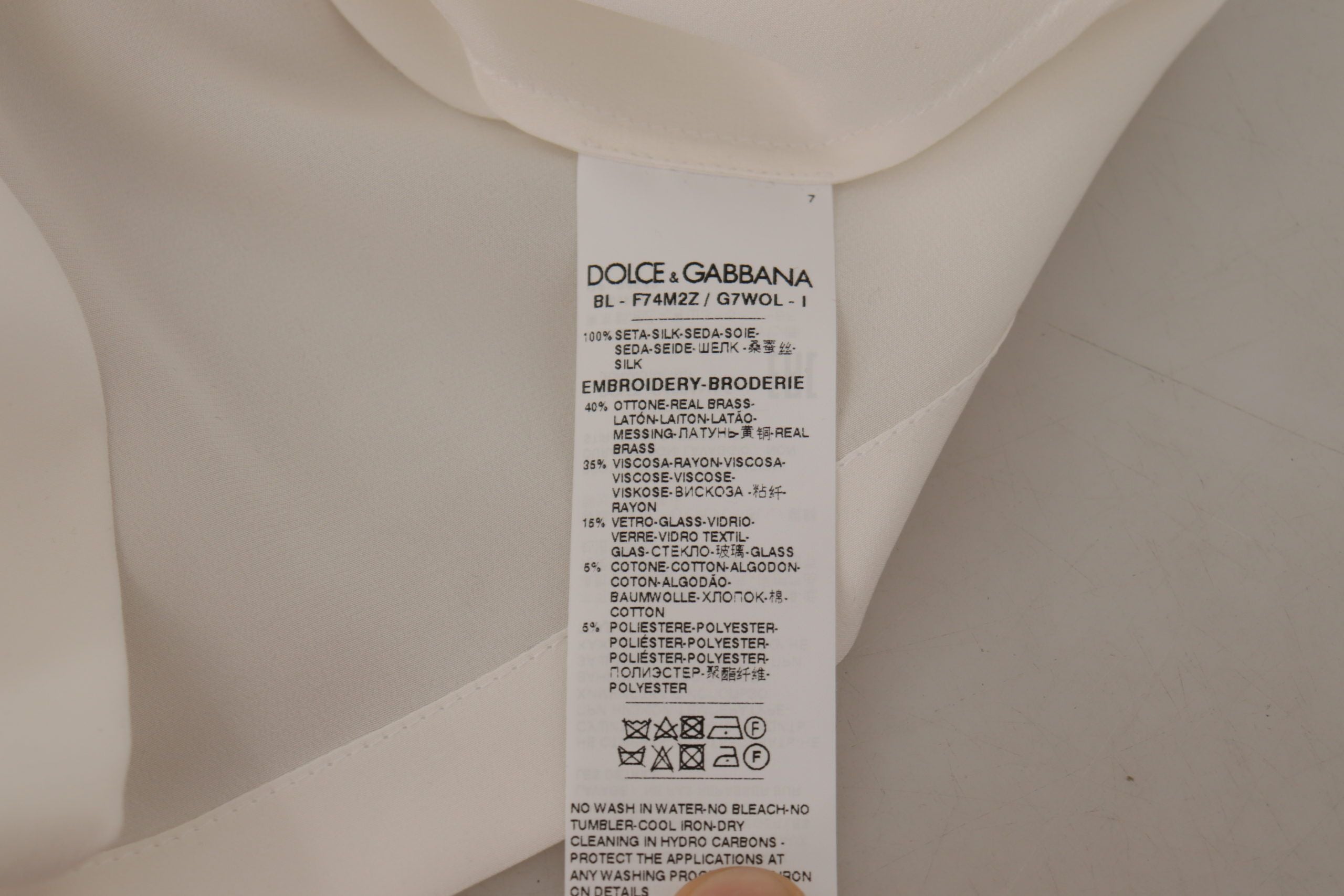 Blusa Dolce &amp; Gabbana de seda blanca con cristales y corona DG dorada