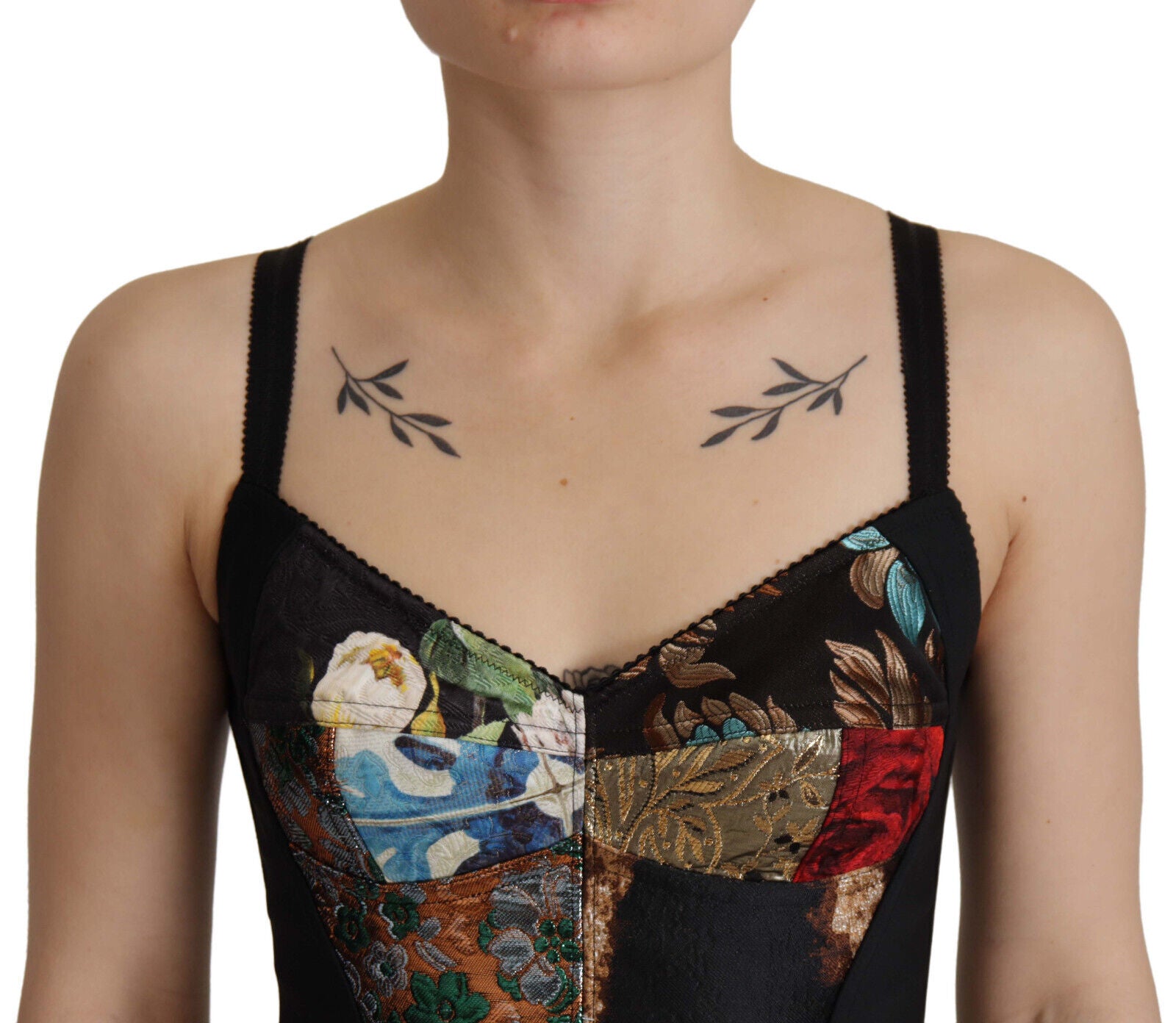 Blusa Siciliana con patchwork negro y top corto con corsé de Dolce &amp; Gabbana