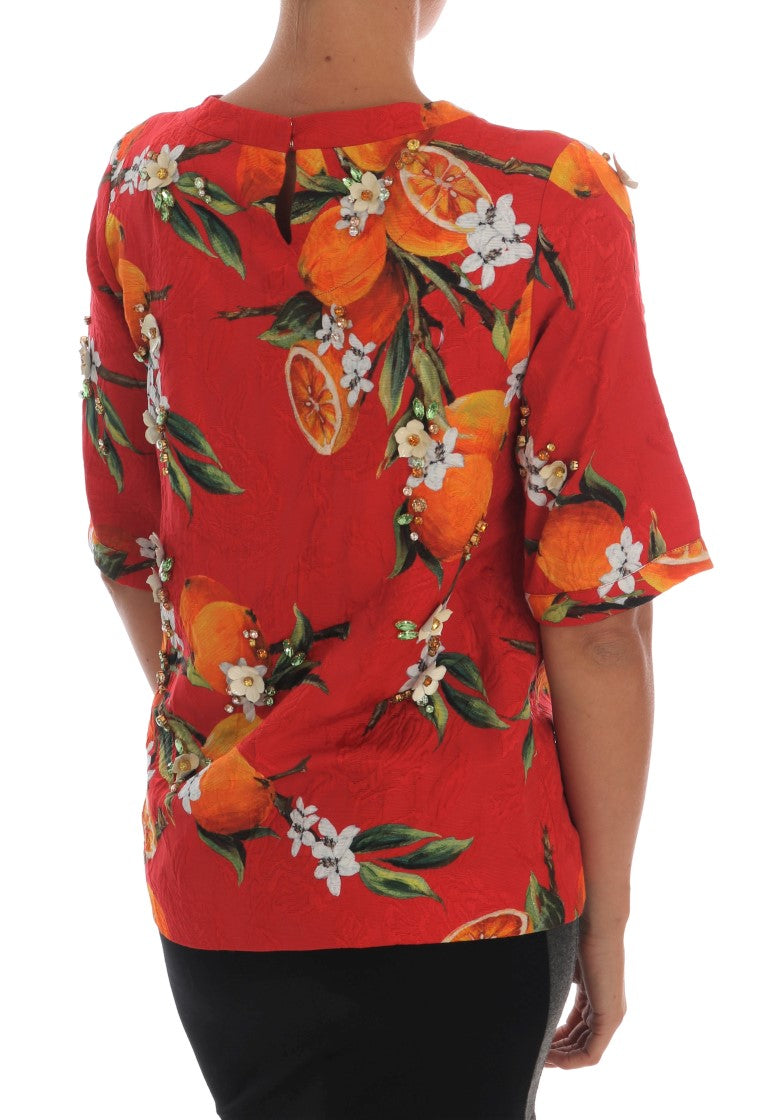 Blusa con estampado naranja y cristales de Dolce &amp; Gabbana
