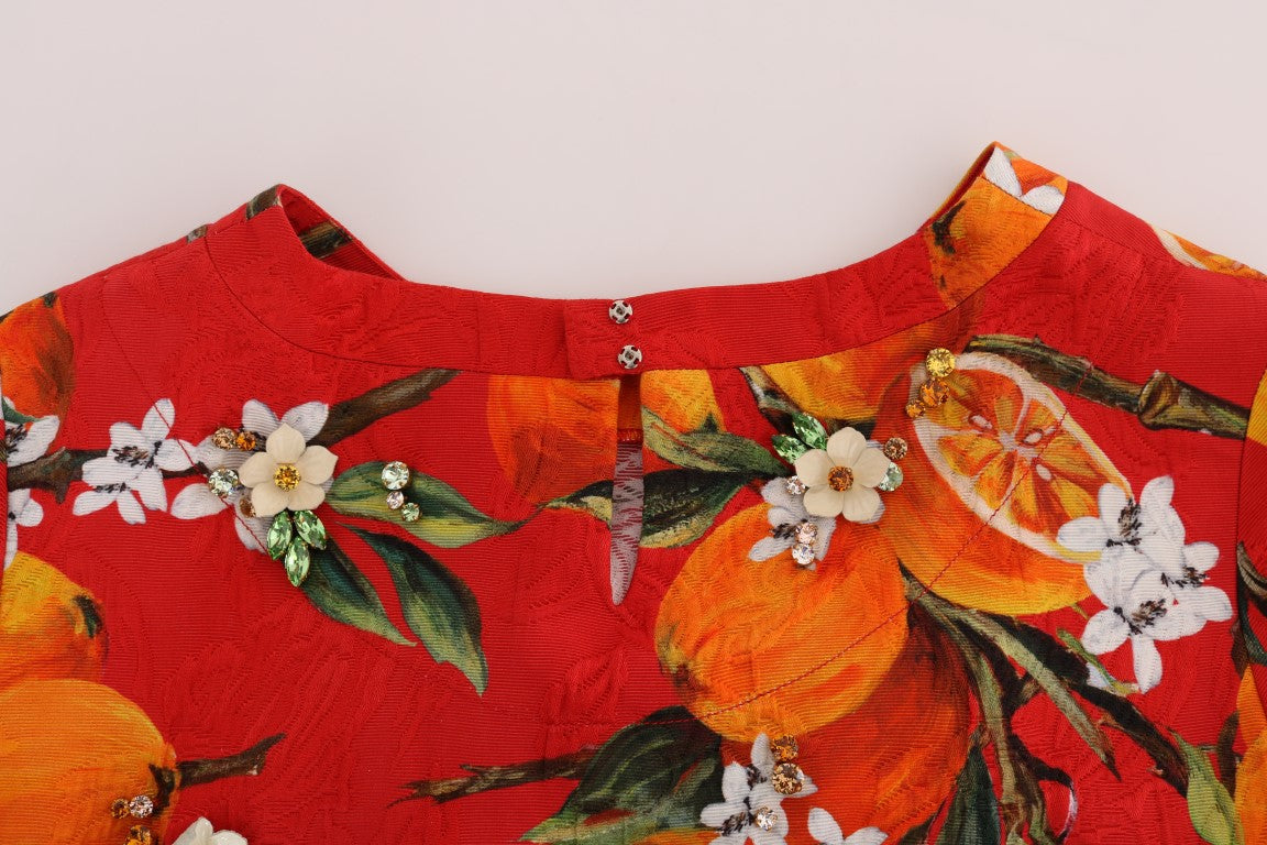 Blusa con estampado naranja y cristales de Dolce &amp; Gabbana