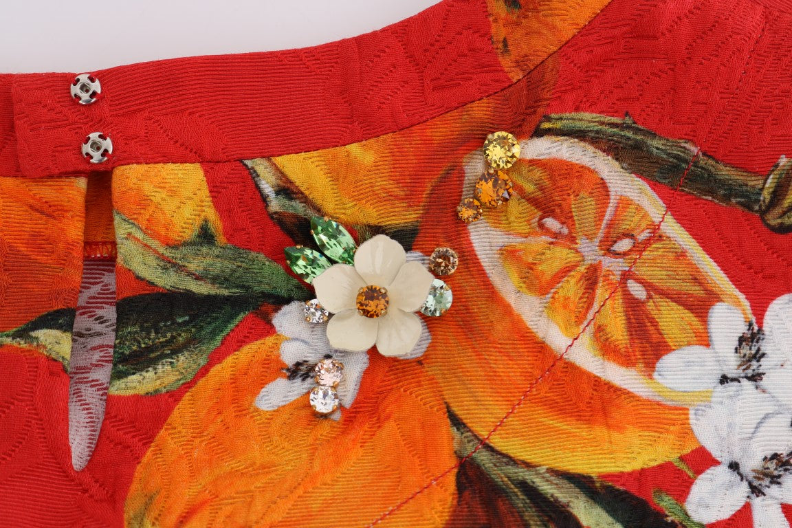 Blusa con estampado naranja y cristales de Dolce &amp; Gabbana