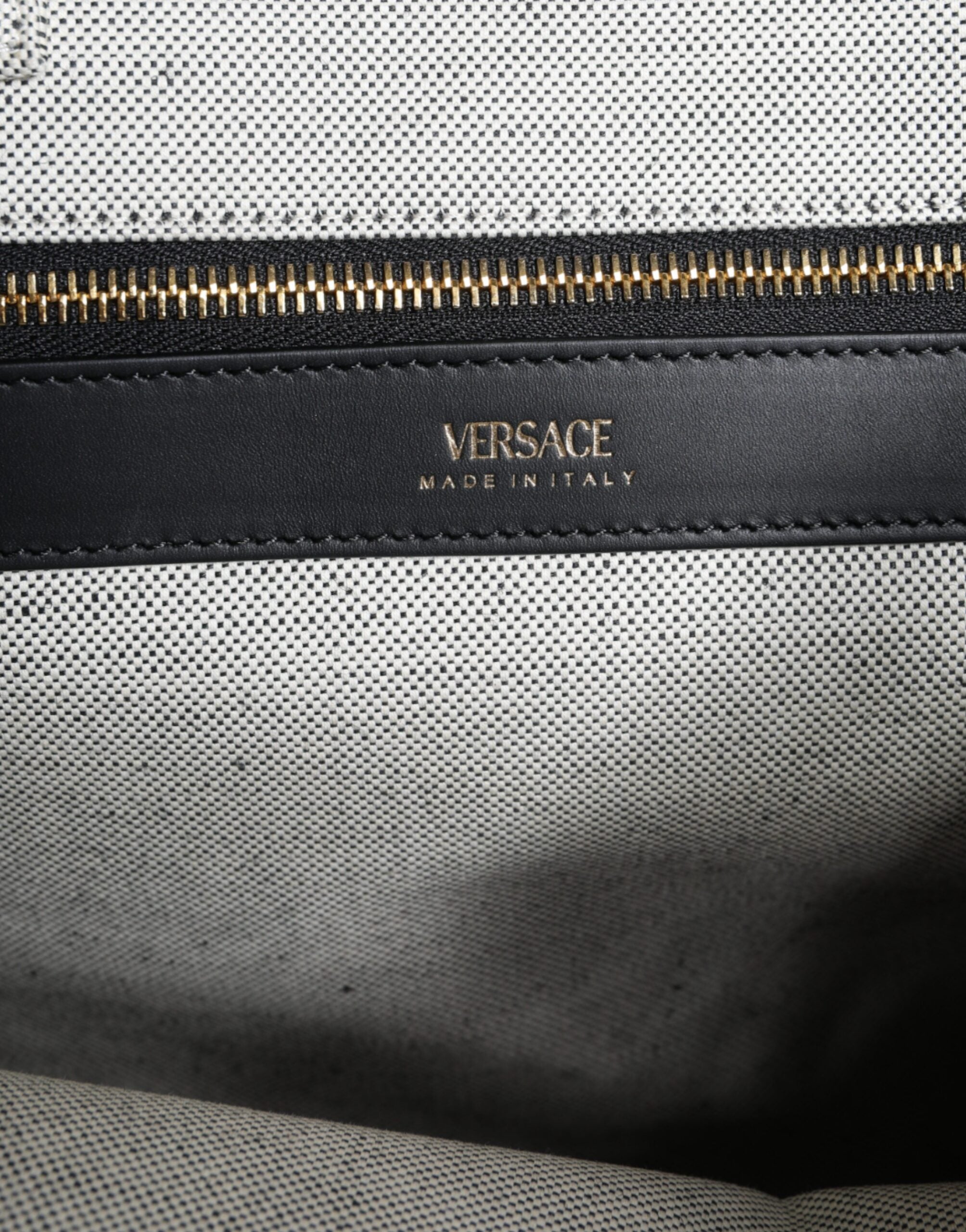 Bolso tote cruzado Versace de lona blanca con asa superior y logotipo de cuero