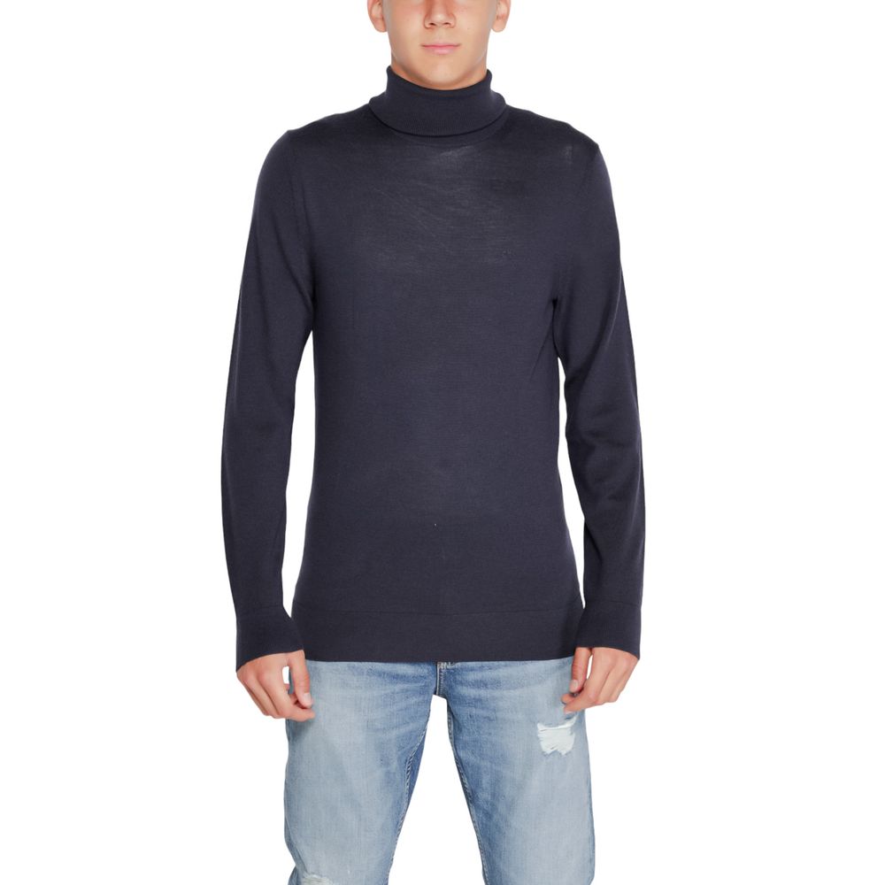 Jersey de cuello alto de lana azul de Calvin Klein