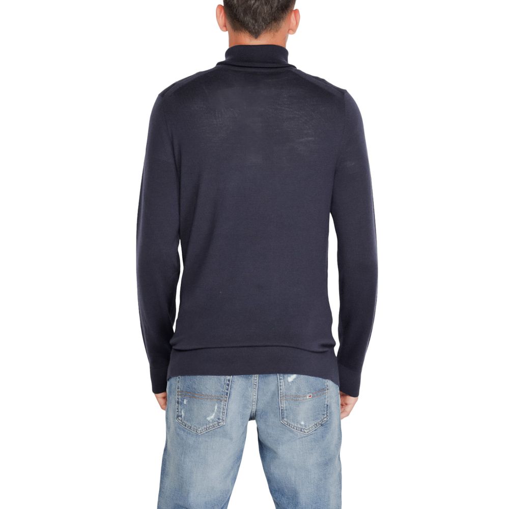 Jersey de cuello alto de lana azul de Calvin Klein