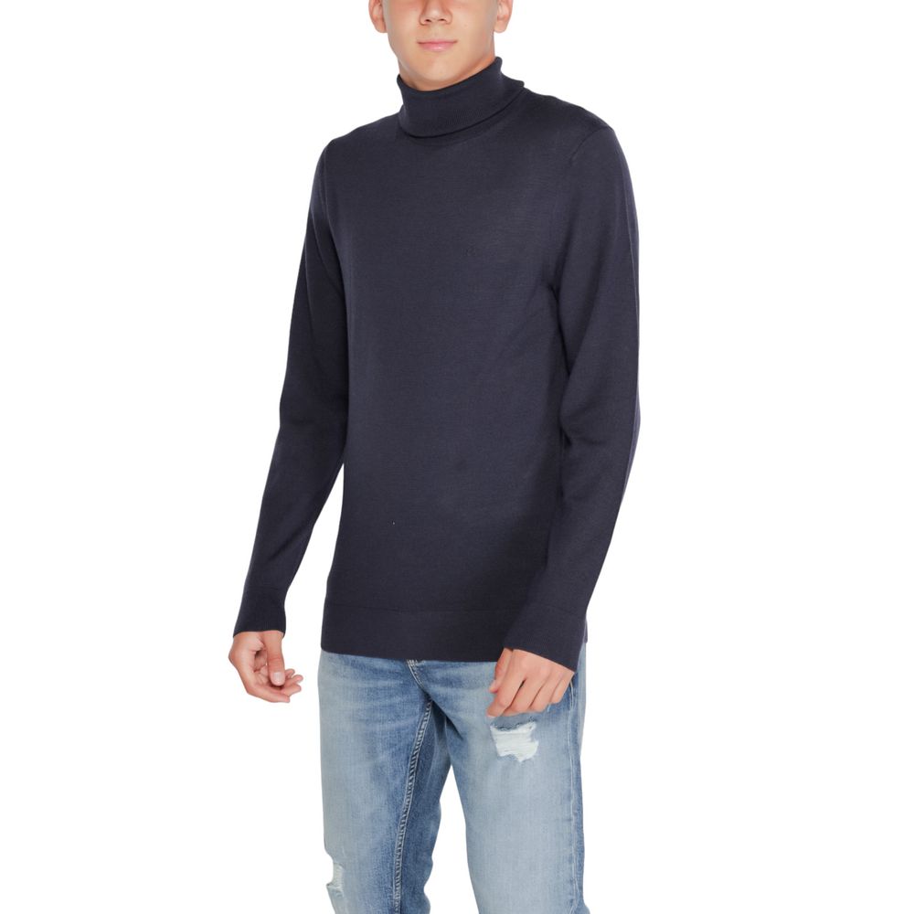 Jersey de cuello alto de lana azul de Calvin Klein