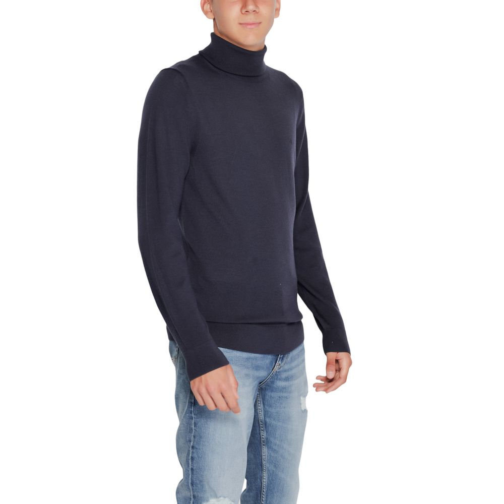 Jersey de cuello alto de lana azul de Calvin Klein