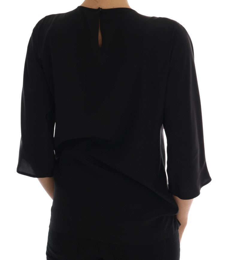Blusa de seda negra con cristales y diseño de cuento de hadas de Dolce &amp; Gabbana