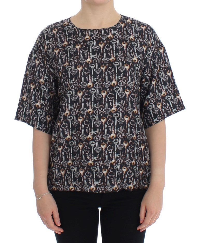 Blusa de seda con estampado de llave dorada en gris de Dolce &amp; Gabbana