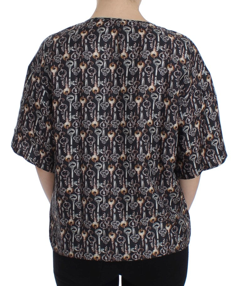 Blusa de seda con estampado de llave dorada en gris de Dolce &amp; Gabbana
