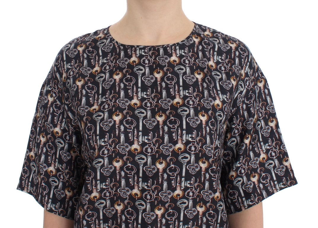 Blusa de seda con estampado de llave dorada en gris de Dolce &amp; Gabbana