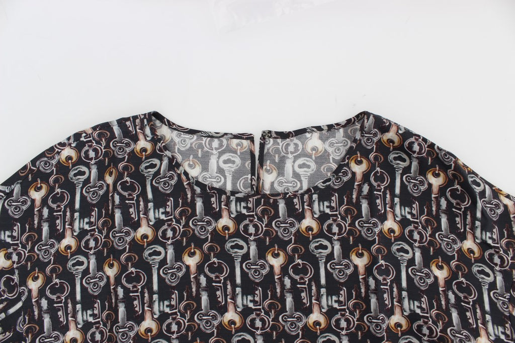 Blusa de seda con estampado de llave dorada en gris de Dolce &amp; Gabbana