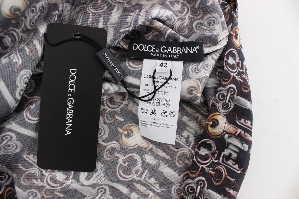 Blusa de seda con estampado de llave dorada en gris de Dolce &amp; Gabbana