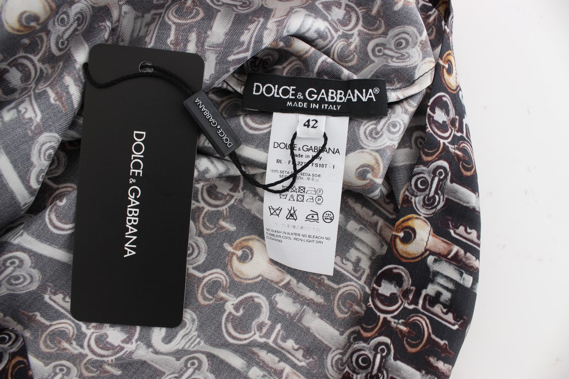 Blusa de seda con estampado de llave dorada en gris de Dolce &amp; Gabbana