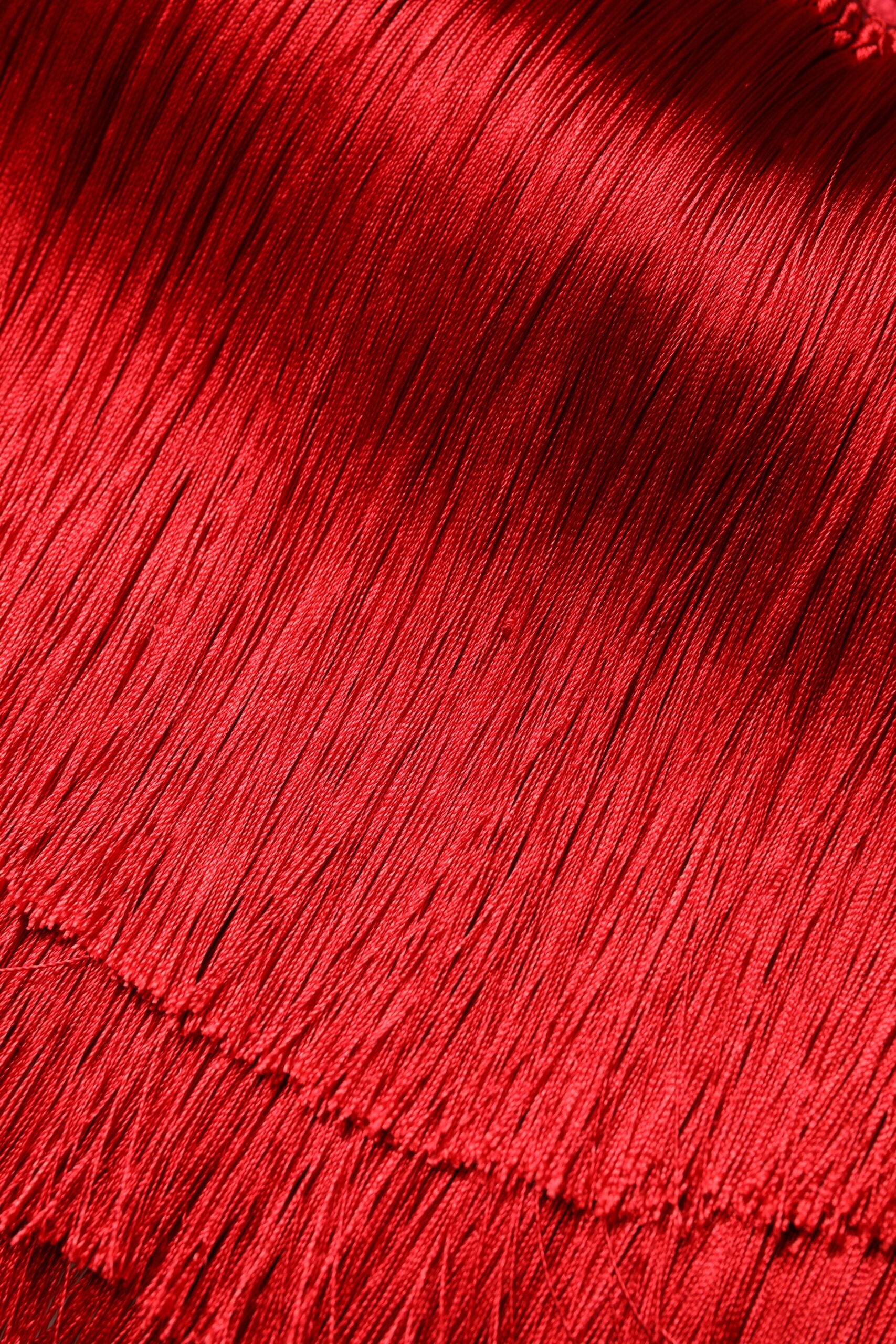 Top corto de tubo con flecos y sin tirantes de seda roja de Dolce &amp; Gabbana